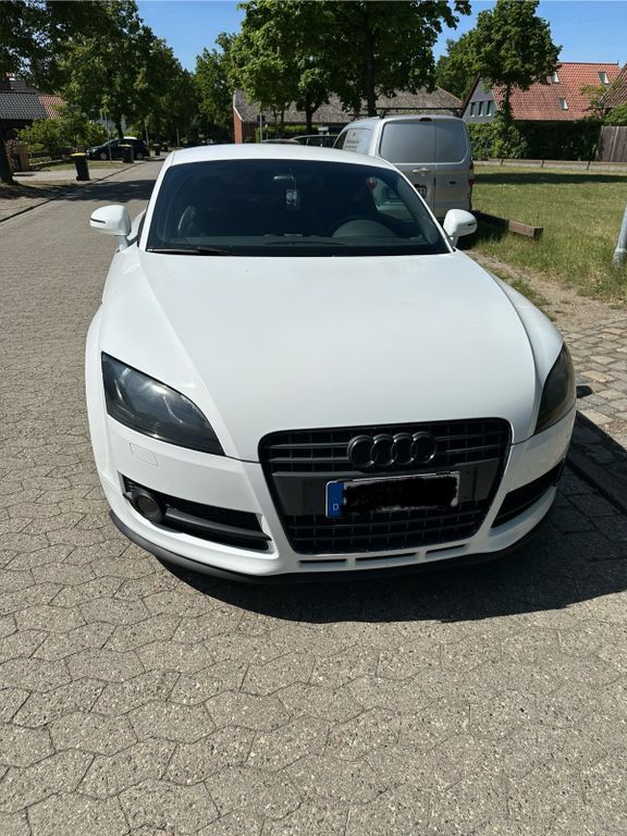 TT