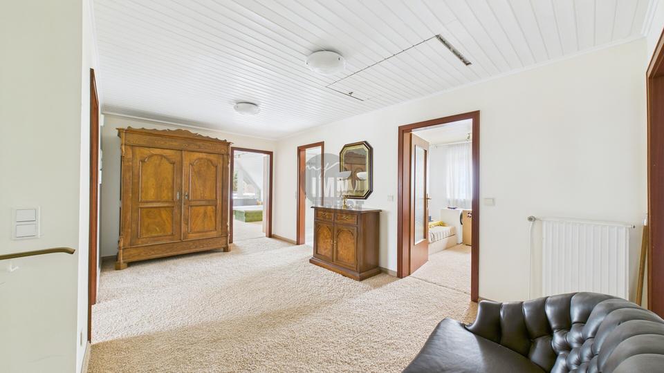 Exklusive Villa in Toplage von Grasdorf – 10 Zimmer, traumhafter Feldblick & Wellnessbereich mit Pool 10 zimmer