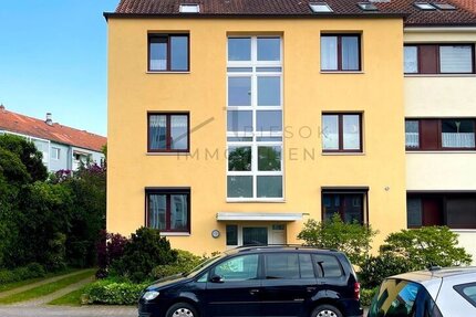Moderne TraumWohnung mit Hauscharakter in idyllischer Lage mit Balkon und 2 Stellplätzen