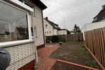 Großzügige 3 Zimmer Wohnung mit Garten , Wintergarten & Garage