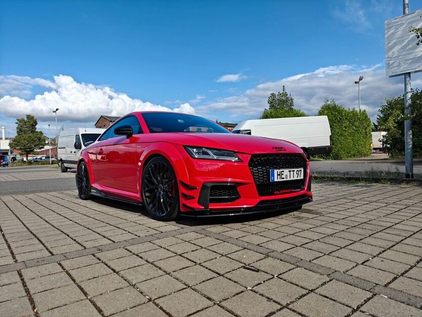 TT
